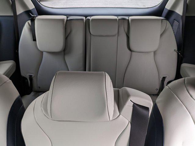 Photo of 2025 Ivory Silver Kia Carnival Hybrid
