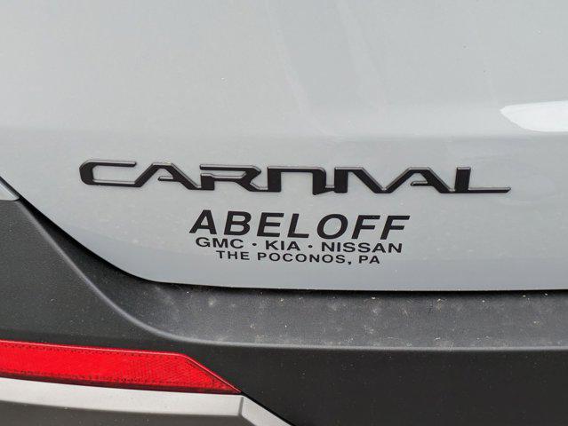 Photo of 2025 Ceramic Silver Kia Carnival Hybrid