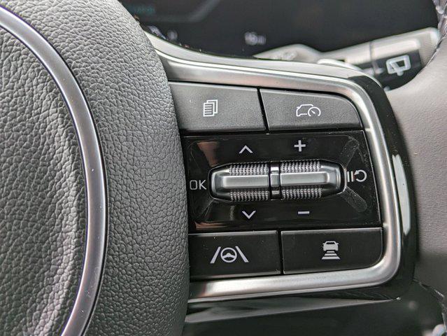 Photo of 2025 Ceramic Silver Kia Carnival Hybrid