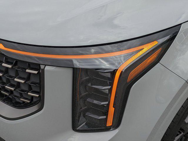Photo of 2025 Ceramic Silver Kia Carnival Hybrid