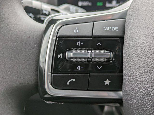 Photo of 2025 Ceramic Silver Kia Carnival Hybrid