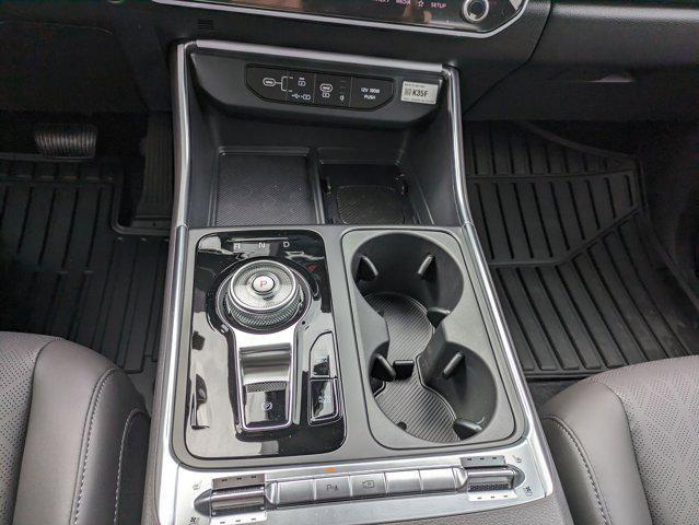 Photo of 2025 Ceramic Silver Kia Carnival Hybrid
