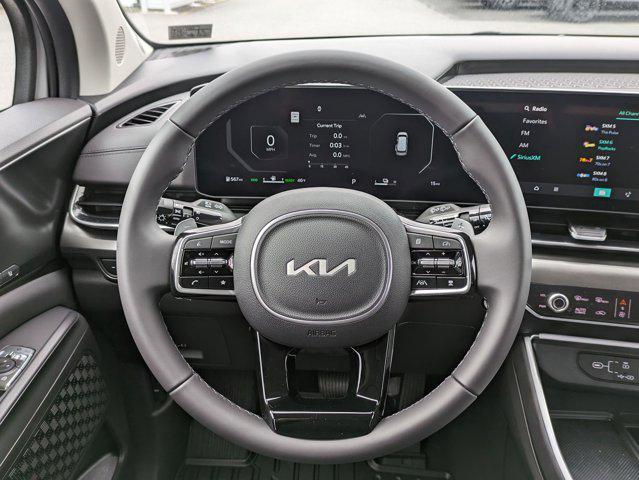 Photo of 2025 Ceramic Silver Kia Carnival Hybrid