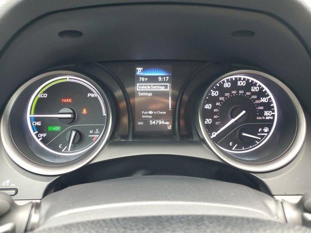 Photo of 2024 Midnight Black Metallic Toyota Camry Hybrid