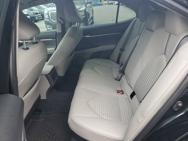 Photo of 2024 Midnight Black Metallic Toyota Camry Hybrid