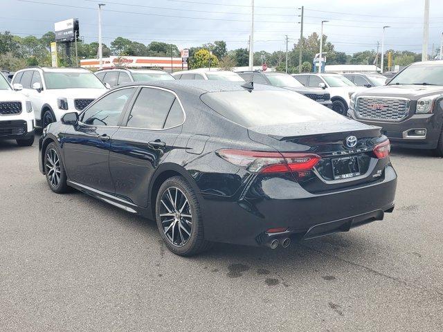 Photo of 2024 Midnight Black Metallic Toyota Camry Hybrid