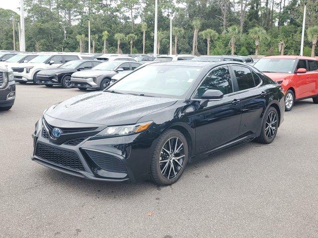 Photo of 2024 Midnight Black Metallic Toyota Camry Hybrid