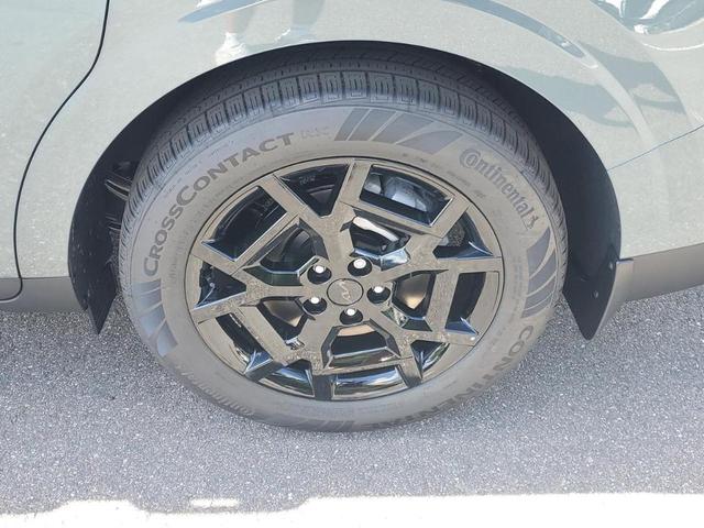 Photo of 2026 Astra Blue Kia Carnival Hybrid
