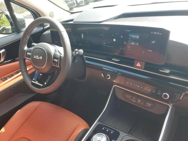 Photo of 2026 Astra Blue Kia Carnival Hybrid