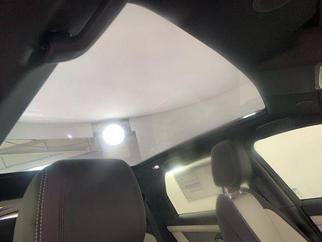 Photo of 2024 Blue Metallic Land Rover Discovery Sport