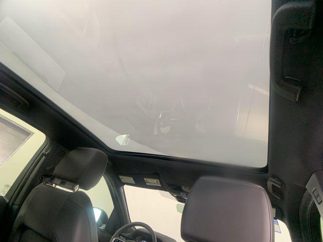 Photo of 2024 Blue Metallic Land Rover Discovery Sport