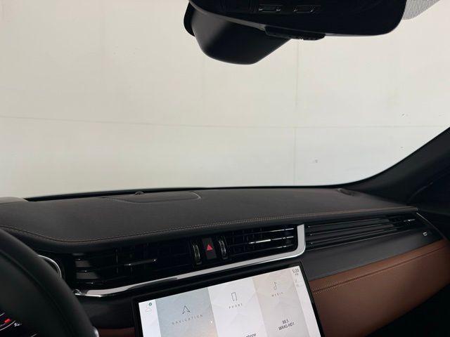 Photo of 2026 Ostuni Pearl White Jaguar F-PACE