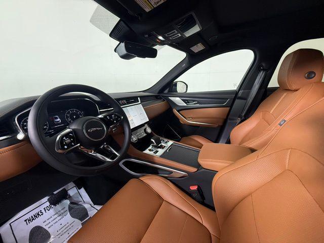 Photo of 2026 Ostuni Pearl White Jaguar F-PACE