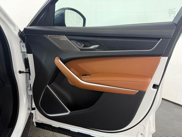 Photo of 2026 Ostuni Pearl White Jaguar F-PACE