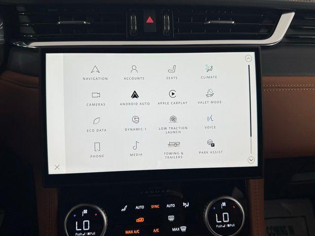 Photo of 2026 Ostuni Pearl White Jaguar F-PACE