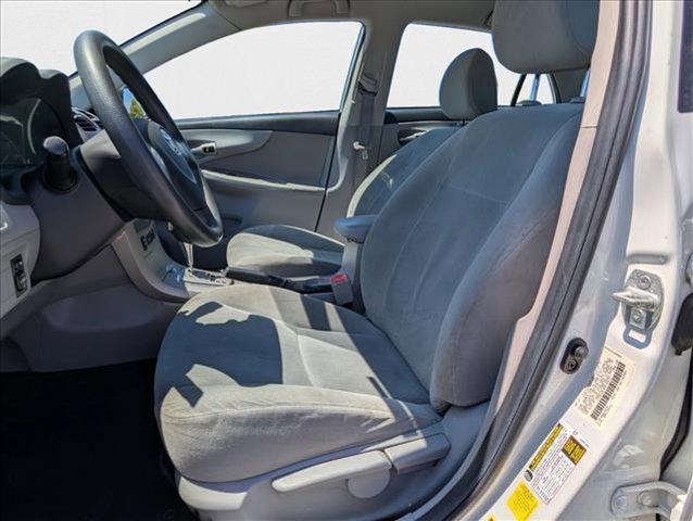 Photo of 2013 Super White Toyota Corolla