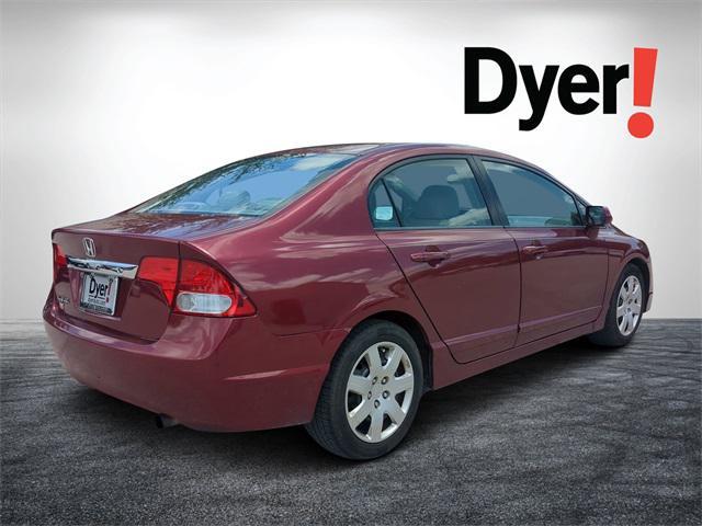 Photo of 2010 Tango Red Pearl Honda Civic