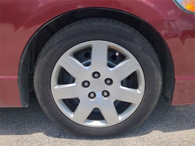 Photo of 2010 Tango Red Pearl Honda Civic