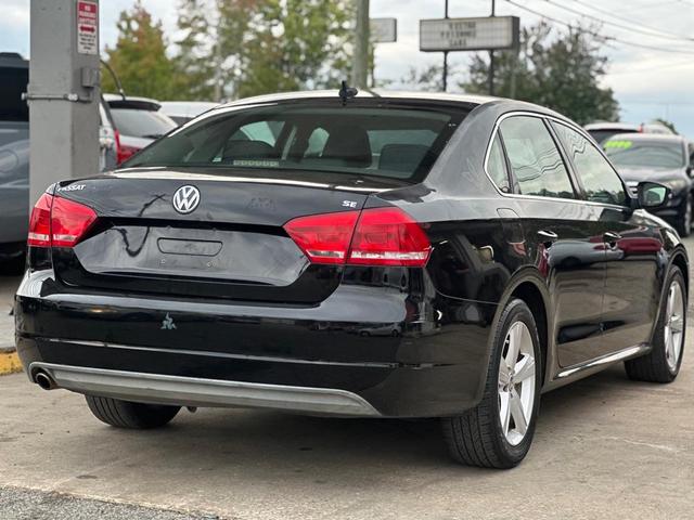 Photo of 2013 Black Volkswagen Passat