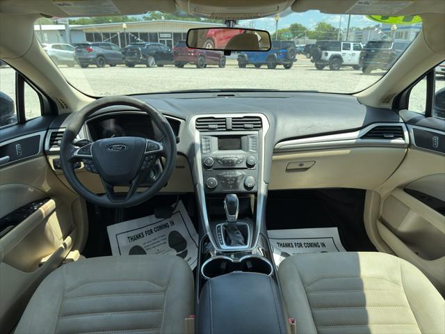 Photo of 2014 Dark Side Metallic Ford Fusion