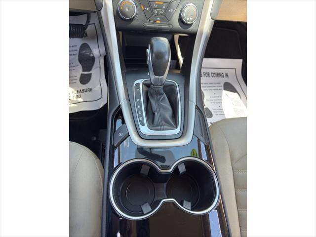 Photo of 2014 Dark Side Metallic Ford Fusion