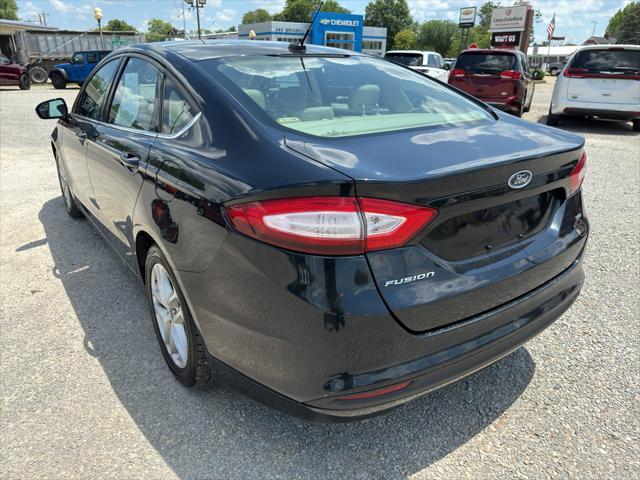Photo of 2014 Dark Side Metallic Ford Fusion