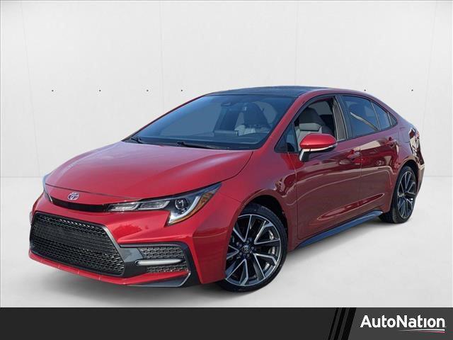 Photo of 2021 Barcelona Red Metallic w/Black Sand Pearl Roof Toyota Corolla