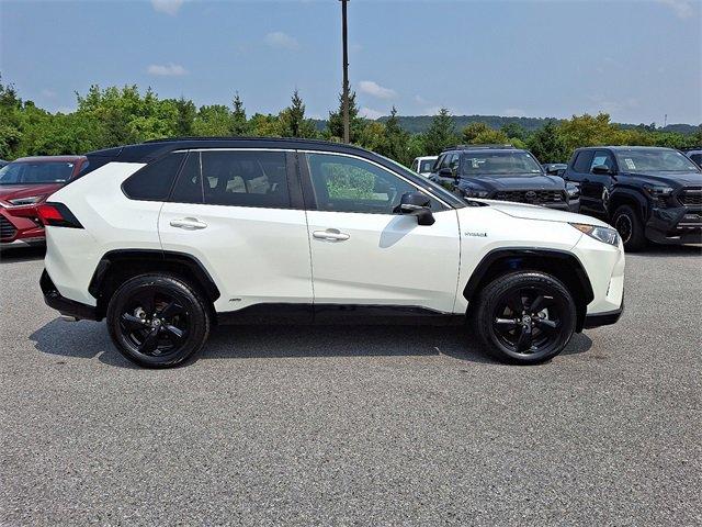 Photo of 2021 Blizzard Pearl/Midnight Black Metallic Toyota RAV4 Hybrid