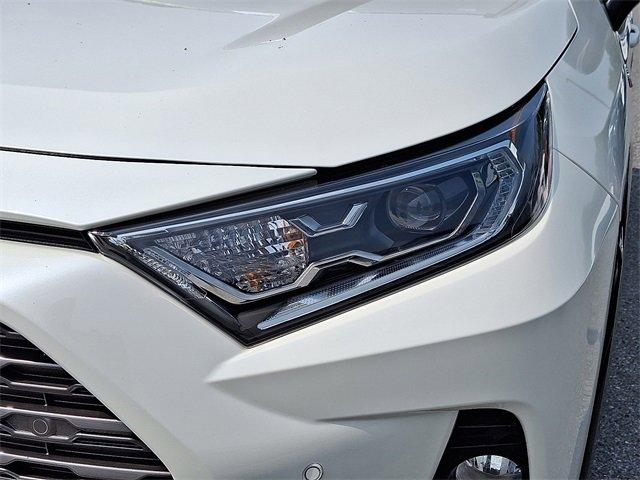 Photo of 2021 Blizzard Pearl/Midnight Black Metallic Toyota RAV4 Hybrid