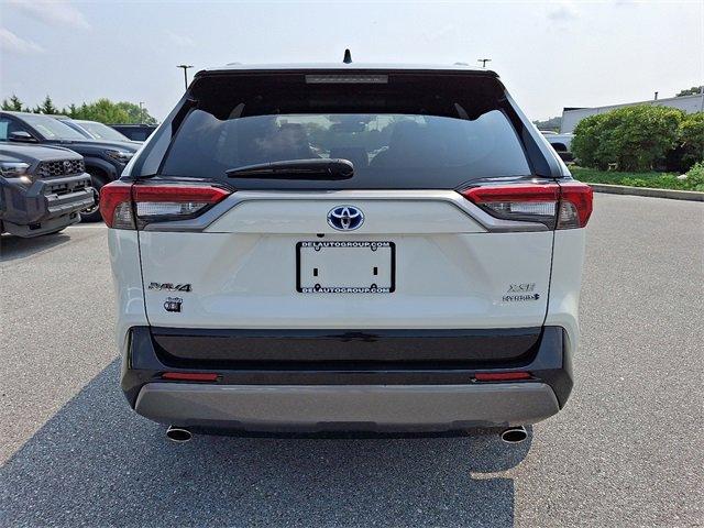 Photo of 2021 Blizzard Pearl/Midnight Black Metallic Toyota RAV4 Hybrid