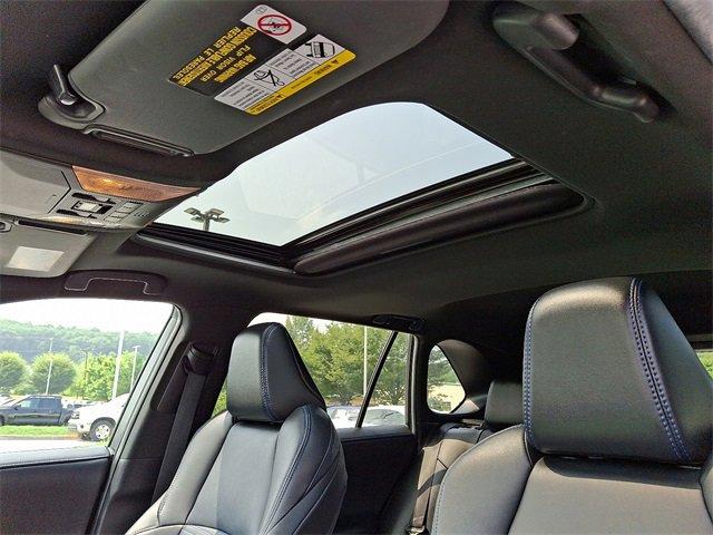 Photo of 2021 Blizzard Pearl/Midnight Black Metallic Toyota RAV4 Hybrid
