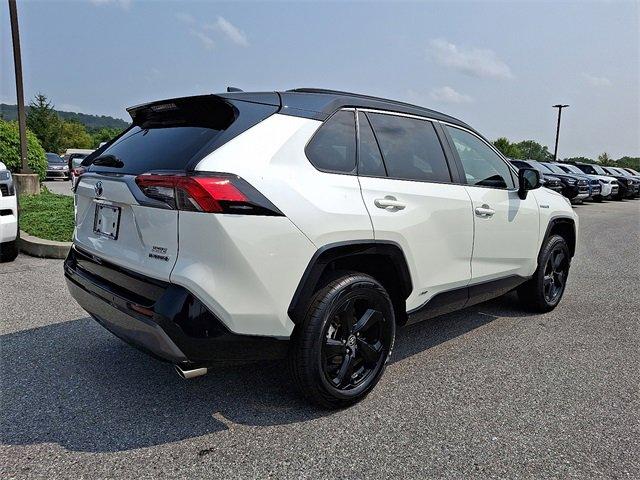 Photo of 2021 Blizzard Pearl/Midnight Black Metallic Toyota RAV4 Hybrid