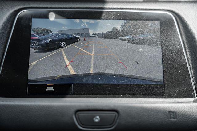 Photo of 2021 Stellar Black Metallic Cadillac XT4