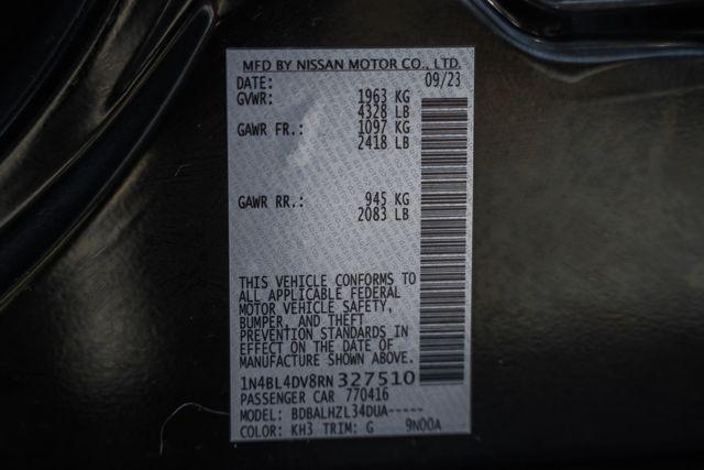 Photo of 2024 Super Black Clearcoat Nissan Altima