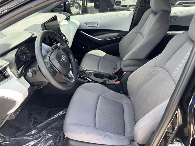 Photo of 2023 Midnight Black Metallic Toyota Corolla