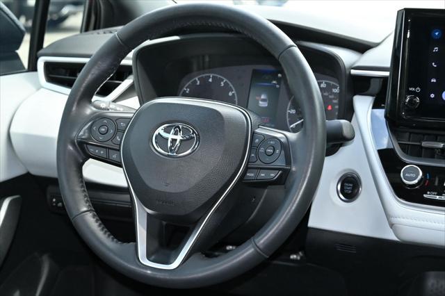 Photo of 2023 Midnight Black Metallic Toyota Corolla