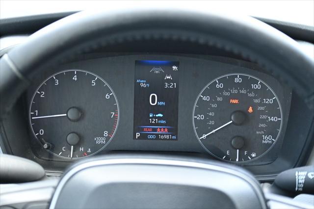 Photo of 2023 Midnight Black Metallic Toyota Corolla