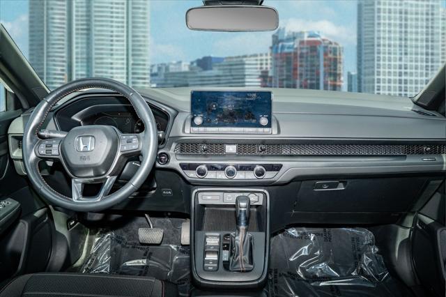 Photo of 2024 Platinum White Pearl Honda CR-V Hybrid