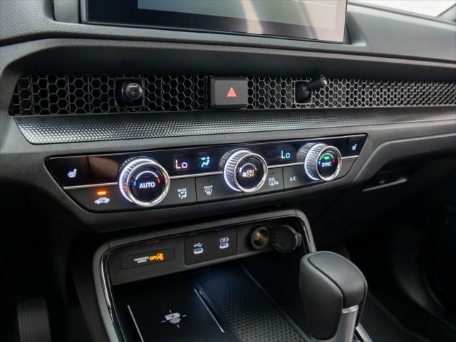 Photo of 2025 Platinum White Pearl Honda CR-V Hybrid