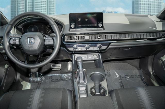 Photo of 2024 Aegean Blue Metallic Honda Civic