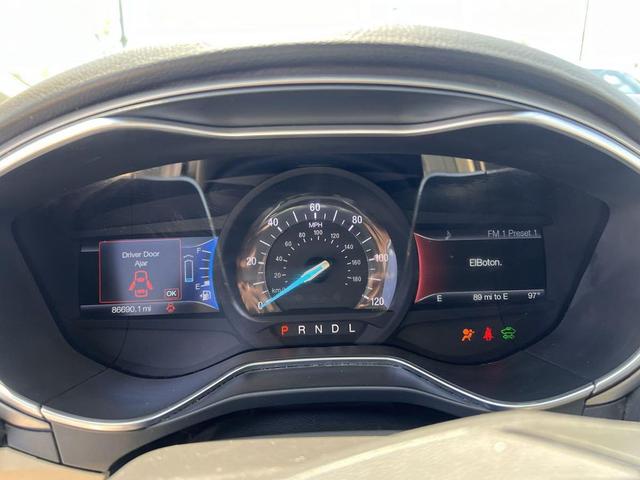 Photo of 2016 Oxford White Ford Fusion Hybrid