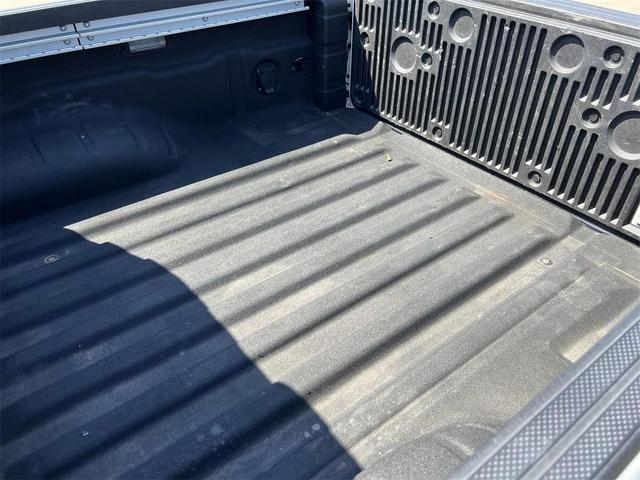 Photo of 2024 Glacier White Nissan Frontier