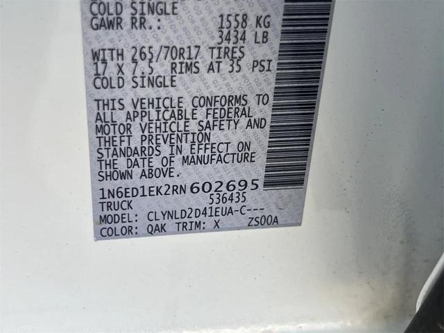 Photo of 2024 Glacier White Nissan Frontier