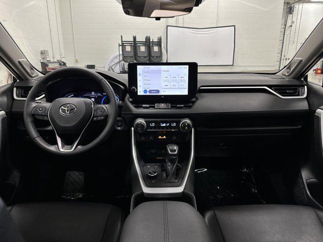 Photo of 2023 Wind Chill Pearl Toyota RAV4 Hybrid