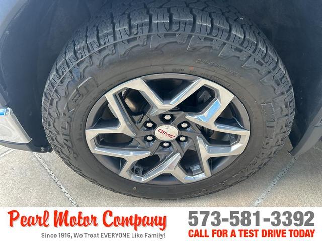 Photo of 2023 Summit White GMC Sierra 1500