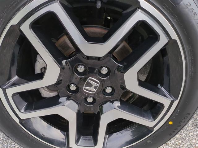 Photo of 2023 Crystal Black Pearl Honda Passport