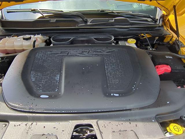 Photo of 2023 Baja Yellow Clearcoat RAM 1500