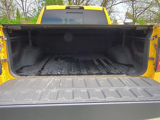 Photo of 2023 Baja Yellow Clearcoat RAM 1500
