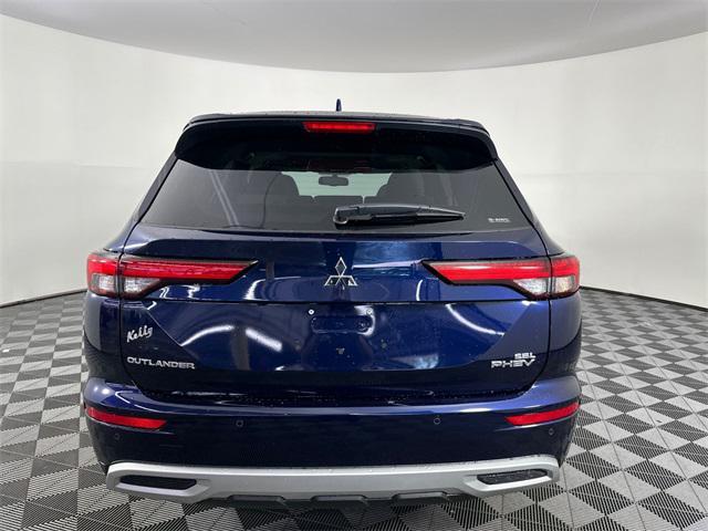 Photo of 2025 Cosmic Blue Metallic Mitsubishi Outlander PHEV