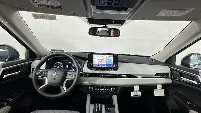 Photo of 2025 Cosmic Blue Metallic Mitsubishi Outlander PHEV